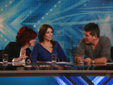Cowell denies 'X Factor' feud rumours