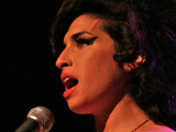 Winehouse pals happy with arrest details