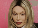 Burns to get payout for botched lips