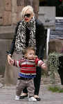 Gwen Stefani takes her son Kingston out for a walk in his gold pushchair, Stokholm, Sweden, on Oct 11