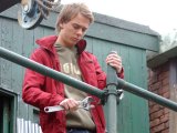 David loosens the scaffolding