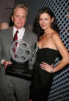 Michael Douglas with his Lifetime Achievement Award and Catherine Zeta Jones at the opening Night of The Savannah Film Festival in Savannah, Georgia, on Oct 27
