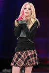 Avril Lavigne performing Chris Willis, David Guetta and Victoria Silvstedt on stage 