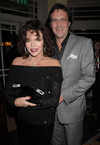 Joan Collins and Percy Gibson at La Brasserie re-launch party, London, on Nov 13