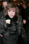 Joan Collins turns on Christmas lights at Burlington Arcade, London, on Nov 20