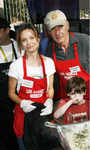 Calista Flockhart, Harrison Ford and Calista's son serving Thanksgiving meals to the homeless, Los Angeles, on Nov 21 