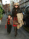 Joan Collins and grandson at San Lorenzo restaurant, London, on Nov 26