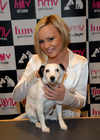 Chanelle Hayes and a dog open the new HMV Store in Folkstone, on Nov 28