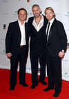 Mikey Graham, Shane Lynch and Ronan Keating at The Emeralds and Ivy Ball, Old Billingsgate Market, London, on Nov 30 