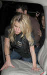 Jessica Simpson looking worse for wear as she crawls into her limo helped by boyfriend Tony Romo, leaving 'The Key Club' in West Hollywood, Los Angeles, on Jan 28 