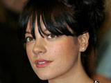 Lily Allen exposes breast on chatshow