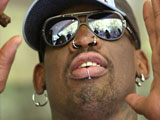 Rodman charged with spousal abuse