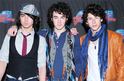 The Jonas Brothers celebrate the end of their tour at Planet Hollywood