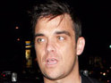 Robbie confirms Take That collaboration