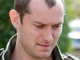 Jude Law seen kissing Kimberly Stewart