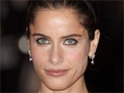 Amanda Peet signs for Emmerich's '2012'