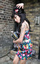 Amy Winehouse (with a Blake heart on her hair) leaving her home on the way to the Ivor Novello awards at the Grosvenor