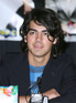Joe Jonas of The Jonas Brothers at Adobe Bluffs Elementary School in San Diego, America
