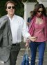 Sir Paul McCartney and girlfriend Nancy Shevell return to London after romantic holiday