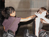 Allen punches woman outside club
