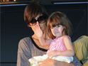 Holmes, Jolie talk motherhood in book