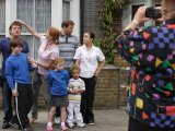 Pat arranges a family photograph