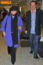 Joan Collins and husband Percy Gibson at Heathrow Airport