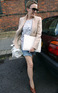Kylie Minogue leaving her management offices in London