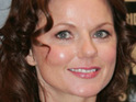 Halliwell vows to raise daughter in UK