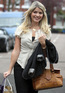 Holly Willoughby who has annouced she in pregnant leaving her home in London