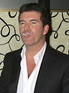 Simon Cowell smoking outside Scotts Restaurant in London