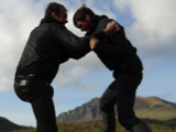Later: Niall and Craig fight on a cliff