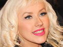 Christina Aguilera 'to reduce workload'