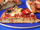 Kobayashi beats rival in pizza contest