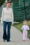 Marcia Cross playing with one of her twin daughters outside their home Los Angeles