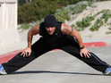 Peter Andre stretching on Malibu beach