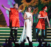 James Corden and Mat Horne help Kylie perform her dance routine