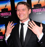 John Partridge performs on stage for the 'Priscilla Queen of the Desert - The Musical' at the Palace Theatre in London.