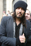 Russell Brand speaks to the press as he makes his way to the Bank of England in central London on the day the G20 begin discussions at the Excel centre, London