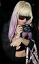 Lady GaGa arriving at her hotel in London, England, photographing the paparazzi