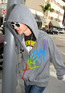 Samantha Ronson tries to avoid photographers by keeping her head down while walking on Bedford Drive wearing a grey hoodie and sunglasses, Los Angeles