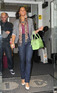 Alesha Dixon leaving Radio One studios carrying a bright green bag, London