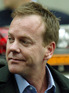 Kiefer Sutherland leaving the New York City Police Department.