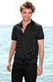 Robert Pattinson poses for cameras to promote the forthcoming 'Twilight' sequel, Cannes