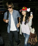 Zac Efron and Vanessa Hudgens leaving Los Angeles International Airport.