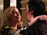 Cain and Maisie kiss