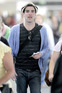 Zachary Quinto boarding an Alaska Airlines flight at LAX to Mexico City with a friend