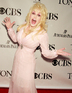 Dolly Parton striking a pose on the red carpet of The 63rd Tony Awards, Radio City Music Hall, New York