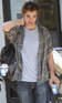 Robert Pattinson takes a break on the set of 'Remember Me' in New York