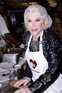 Joan Rivers visiting the 'God's Love We Deliver' facilities, New York City